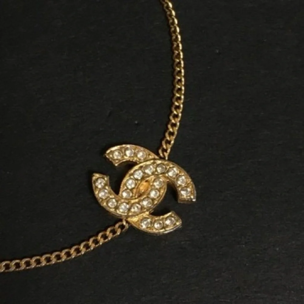 CHANEL GOLD LOGO RHINESTONE BRACELET